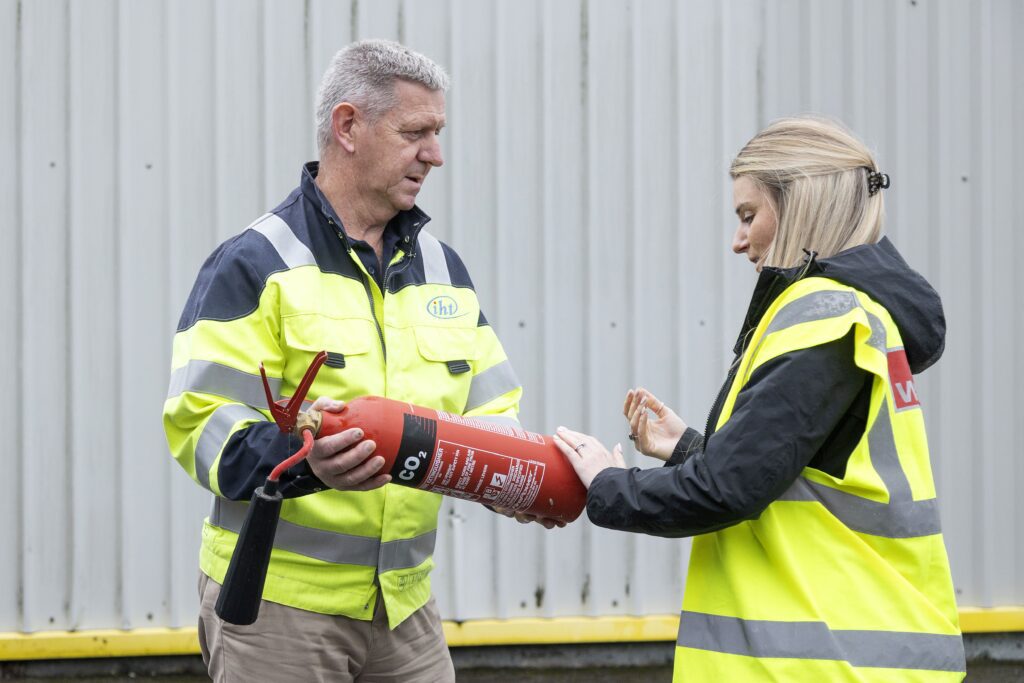 checking a fire extinguisher